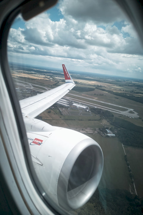 looking out the aircraft window just after takeoff